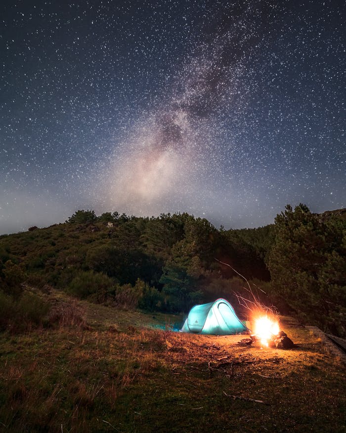 brand-03 Enchanting night camping scene under the Milky Way in Vila Real, Portugal.